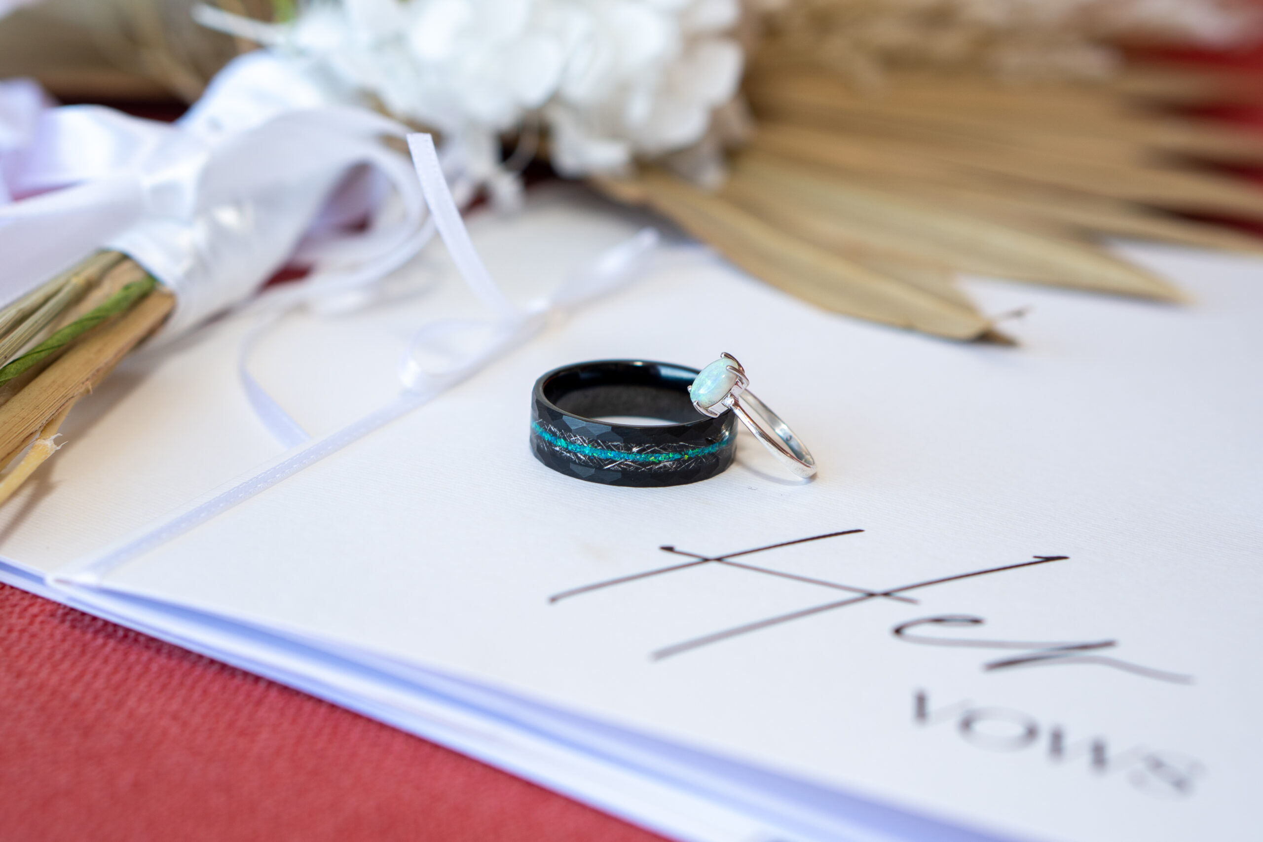 Groom's and bride's rings in detail during an intimate elopement in Brisbane